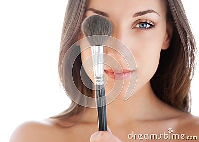 Woman with makeup brush Stock Photo