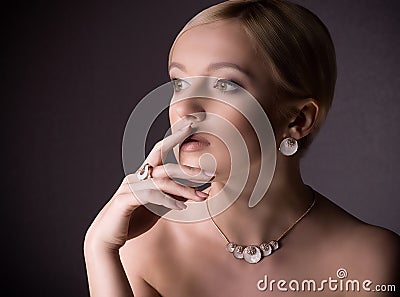 Woman with makeup in luxury jewelry Stock Photo