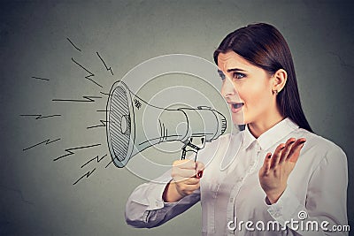 Woman making announcement with megaphone Stock Photo