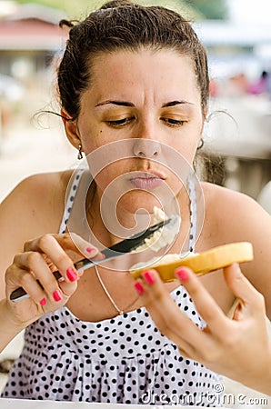 Woman making sandwich Stock Photo