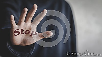 A woman making a stop gesture to drugs, Stop drugs concept. International Day against Drug Abuse. Run Against Drugs Stock Photo