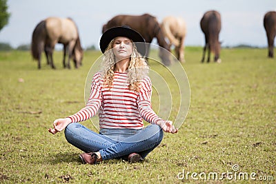 Woman making yoga Stock Photo