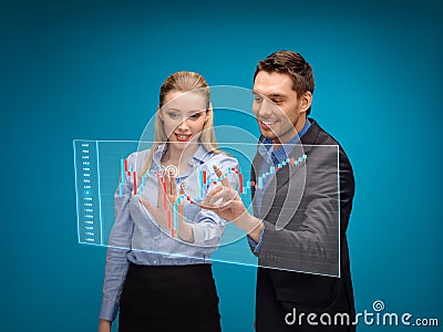 Woman and man working with forex chart Stock Photo