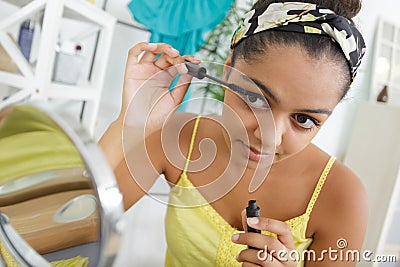 Woman mascara applying with brush Stock Photo