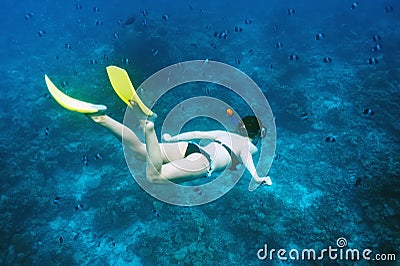 Woman with mask snorkeling Stock Photo