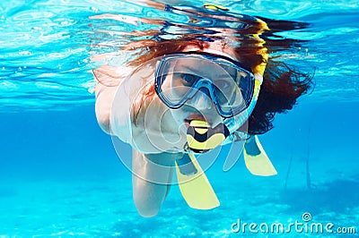 Woman with mask snorkeling Stock Photo