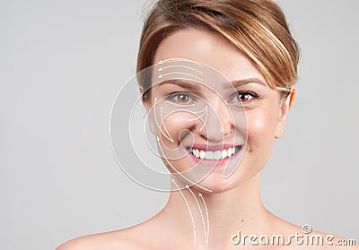 Woman with massage lines. Skin Care. Face lift anti-aging treatment Stock Photo