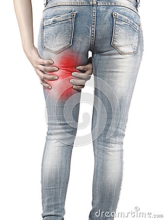Woman massaging her Hamstrings - Anatomy Muscles. Stock Photo