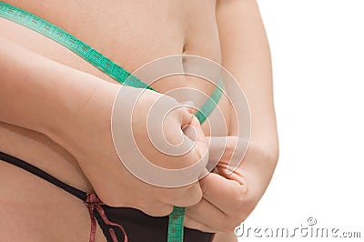 Woman measures by a tape the waist Stock Photo
