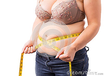 Woman measuring her fat belly Stock Photo