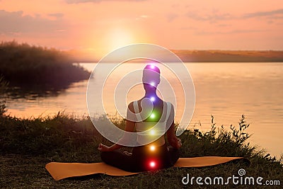 Woman meditating near river in twilight, back view. Scheme of seven chakras Cartoon Illustration