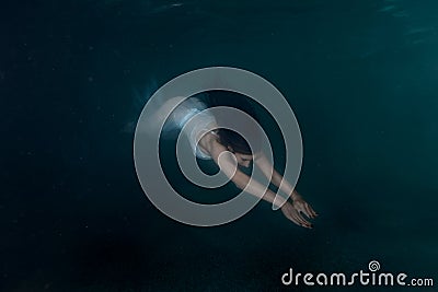 Woman mermaid under water. Stock Photo