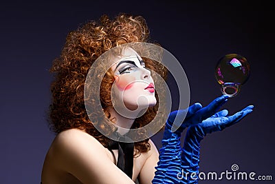 Woman mime with soap bubbles. Stock Photo