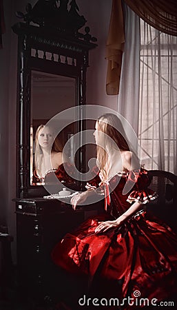 Woman and mirror Stock Photo