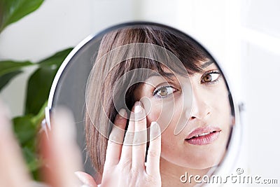 Woman In The Mirror Stock Photo