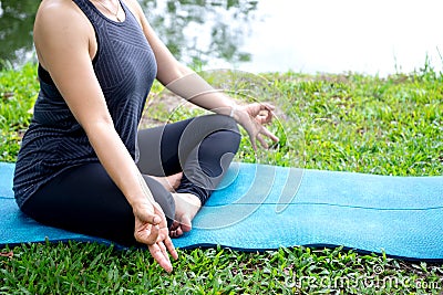 Woman more than 50 year old practicing yoga Stock Photo