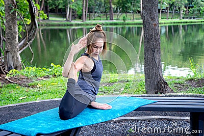Woman more than 50 year old practicing yoga Stock Photo