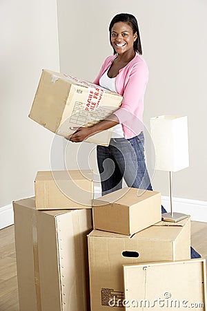 Woman Moving Into New Home Stock Photo