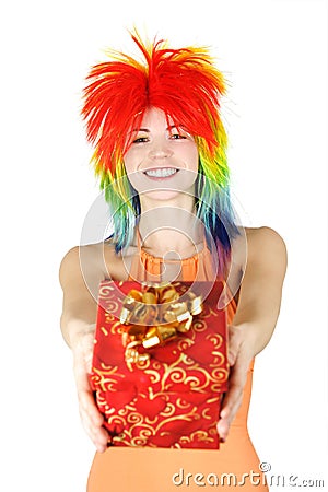 Woman in multicolored wig with gift Stock Photo