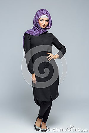 Woman in a Muslim scarf Stock Photo