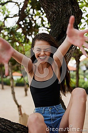 woman nature smiling relax tree vacation sky fitness sea lifestyle sitting Stock Photo