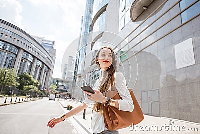 Woman near the parliament building in Brussel Stock Photo