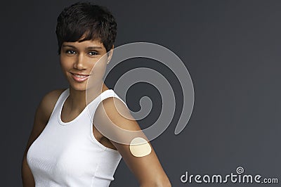 Woman With Nicotine Patch On Arm Stock Photo