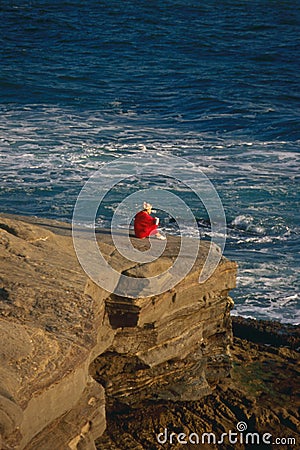 Woman on Ocean Shore Editorial Stock Photo