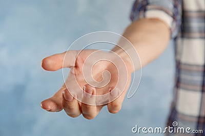 Woman offering helping hand Stock Photo