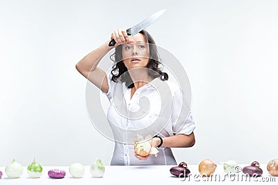 Woman with onions Stock Photo