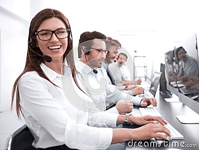 Woman operator in the workplace at the call center Stock Photo