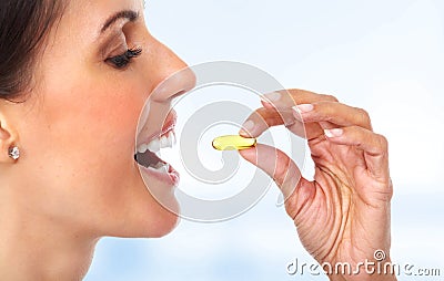 Woman with oral pill. Stock Photo