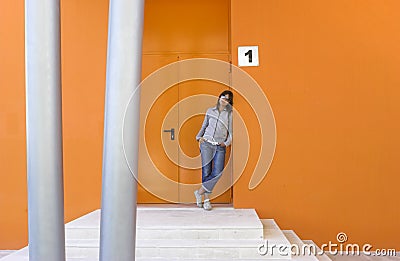 Woman in orange Stock Photo