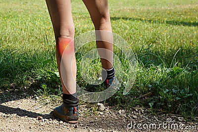 Woman with painful varicose veins and red dot effect Stock Photo