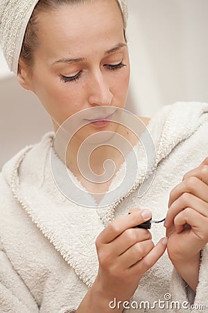 Woman painting nails Stock Photo