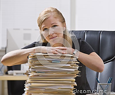 Woman with Paperwork Stock Photo