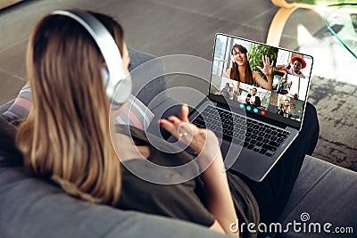 Woman participate video conference looking at laptop screen during virtual meeting, videocall webcam app for business Stock Photo