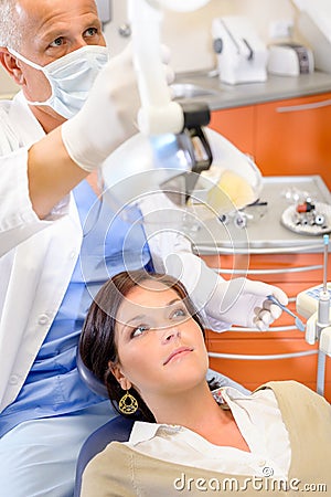 Woman patient at dental hygienist surgery Stock Photo