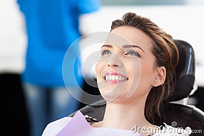 Woman patient at the dentist waiting to be checked up Stock Photo