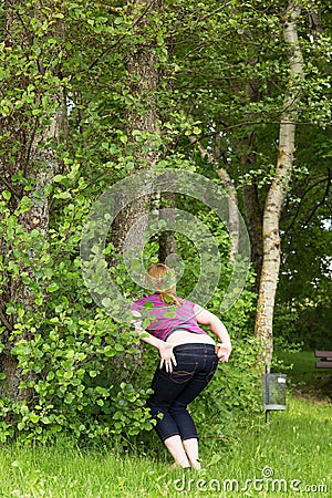 https://thumbs.dreamstime.com/x/woman-peeing-nature-outdoors-behind-bushes-49987893.jpg