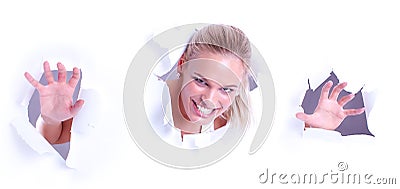 woman peer through the wallpaper and smiling Stock Photo