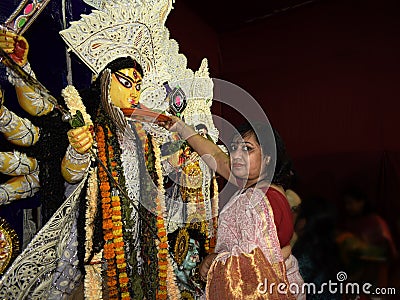 woman performing traditional rituals to hindu goddess& x22;durga& x22; Editorial Stock Photo