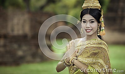 woman performing typical thai dance with thai style temple background Editorial Stock Photo