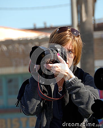 Woman Photographer Stock Photo