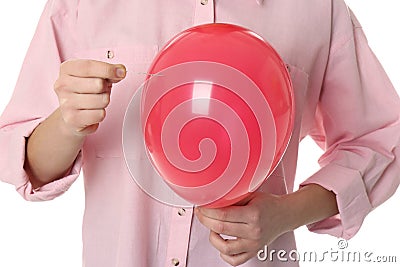 Woman piercing red balloon on white, closeup Stock Photo