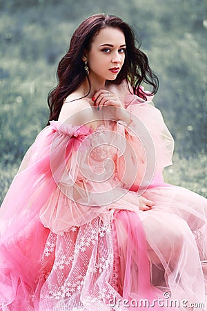 Woman in pink princess dress Stock Photo