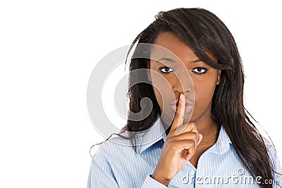 Woman placing finger to lips. Asking to keep secret Stock Photo