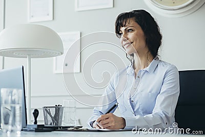 Woman planning her spare time with family Stock Photo