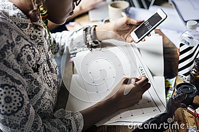 Woman Planning Writing Note on Calendar Stock Photo