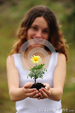 Woman planting a flower Stock Photo